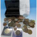 A tin of British coins,