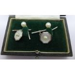 A pair of pearl studs marked 'K9' and a pair of cufflinks