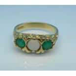 A 9ct gold, opal and green stone ring, 3.