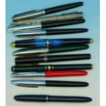Nine ink pens including Parker and Osmiroid and two others