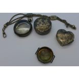 Two pill boxes, a silver fob watch case,