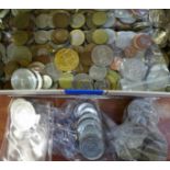 A tin of foreign coins, 1.