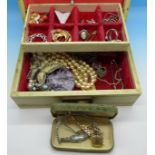 A jewellery box and costume jewellery