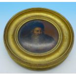A miniature circular portrait of a Russian gentleman,