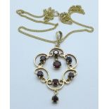 A 9ct gold and garnet pendant on a fine 9ct gold chain, 6.5g, (4.2 + 2.