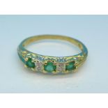 A 9ct gold, emerald and diamond ring, 2g,