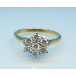 An 18ct gold and diamond cluster ring, 0.5 carat diamond weight, 2.