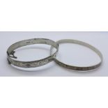 A hallmarked silver bangle and one other bangle