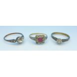 Three 9ct gold and silver rings, total weight 5.