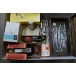 A box of dental and medical equipment