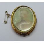 A 9ct gold photograph brooch,