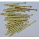 Twenty wooden lace bobbins