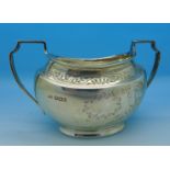 A silver sugar bowl,