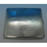 A silver cigarette case,