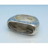 A silver and quartz ring,