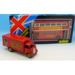 A Solido London Bus, boxed, and a Dinky Toys Guy lorry,