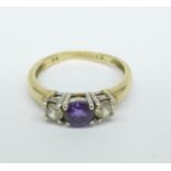 A 9ct gold, three stone ring, 2.