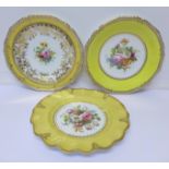 Three Royal Crown Derby cabinet plates, hand decorated and all signed A.