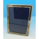 A modern silver photograph frame,