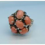 A 9ct gold, silver and coral ring, 6.