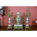 A German FHS rococo revival cast gilt metal and marble clock garniture