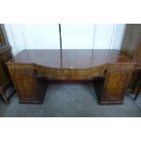 A Victorian mahogany bow-front pedestal sideboard