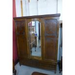 A Waring & Gillows oak wardrobe