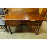 A Victorian mahogany two-drawer side table