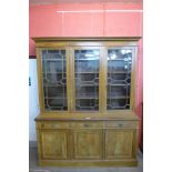 An Edward VII inlaid mahogany library bookcase