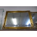 A gilt framed mirror