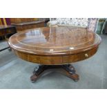 A 19th Century continental inlaid mahogany circular drum library table,