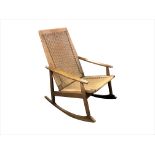 A Danish teak rocking chair,