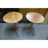 A pair of sycamore tripod tables