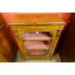 A Victorian marquetry inlaid burr walnut and ormolu mounted pier cabinet