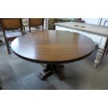 A mahogany circular table