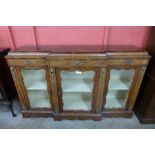 A Victorian inlaid walnut and ormolu mounted breakfront side cabinet