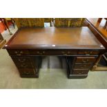 A Victorian mahogany kneehole desk