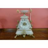 A 19th Century French onyx and ormolu mounted mantel clock, the movement signed Japy Freres,