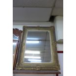 A gilt framed mirror