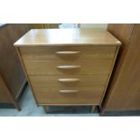 An Austin teak chest of drawers