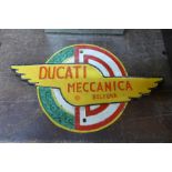 A reproduction Ducati Meccanica cast iron badge