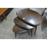 An Ercol pebble shaped nest of tables