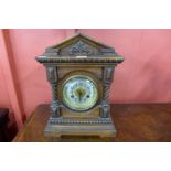 A 19th Century German Junghans carved oak bracket clock