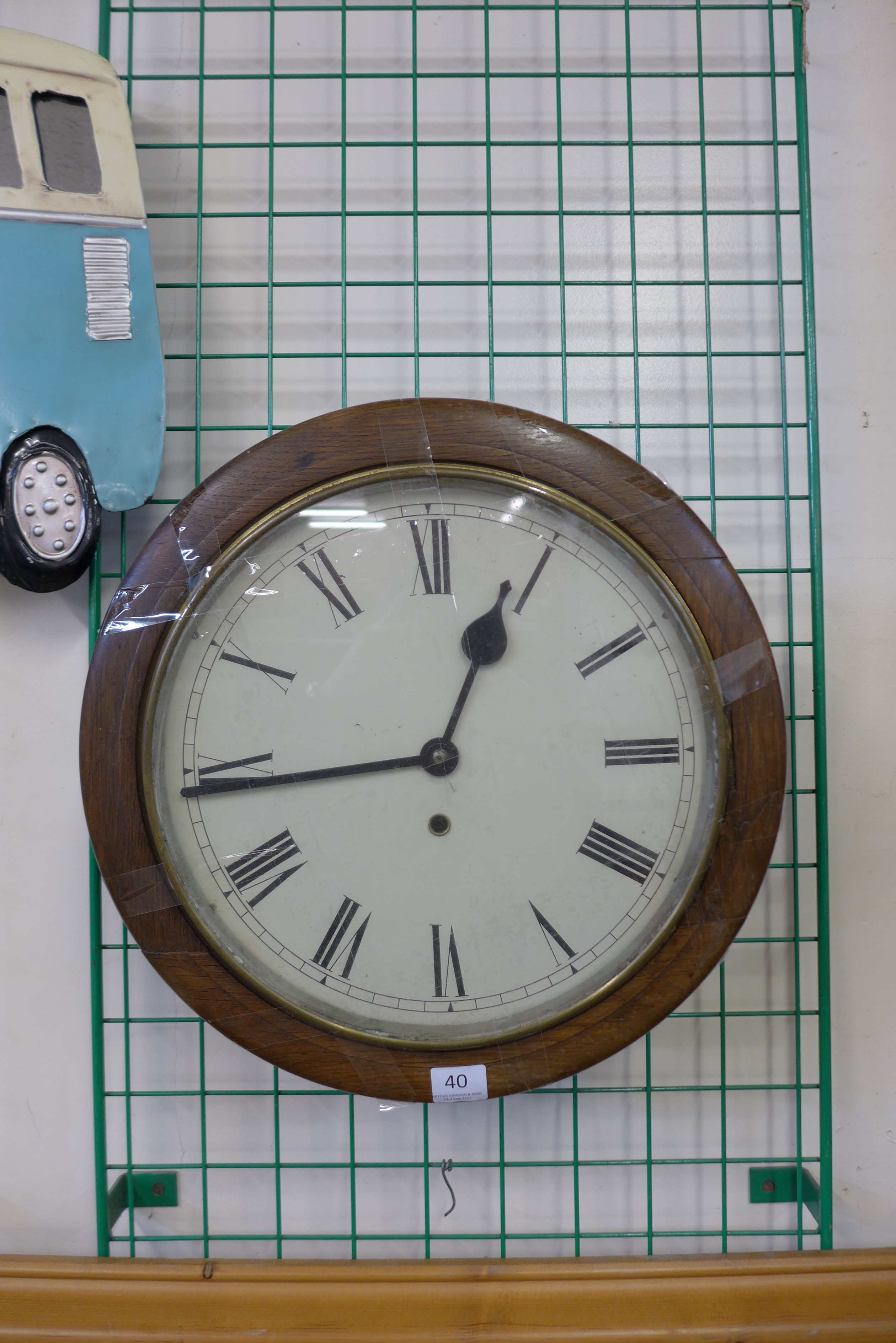 A 19th Century pine and beech circular wall clock