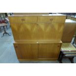 A Danish teak secretaire cabinet