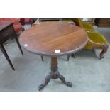 A Victorian mahogany circular tripod table