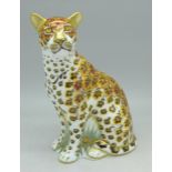 A Royal Crown Derby Leopardess paperweight with gold stopper