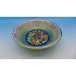 A Mintons lustre dish decorated with fruit, diameter 15.