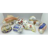 Seven Royal Crown Derby paperweights,