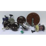 Eight fishing reels including three by Penn,